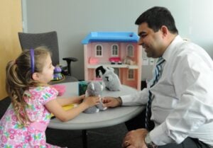 child psychologist helping patient